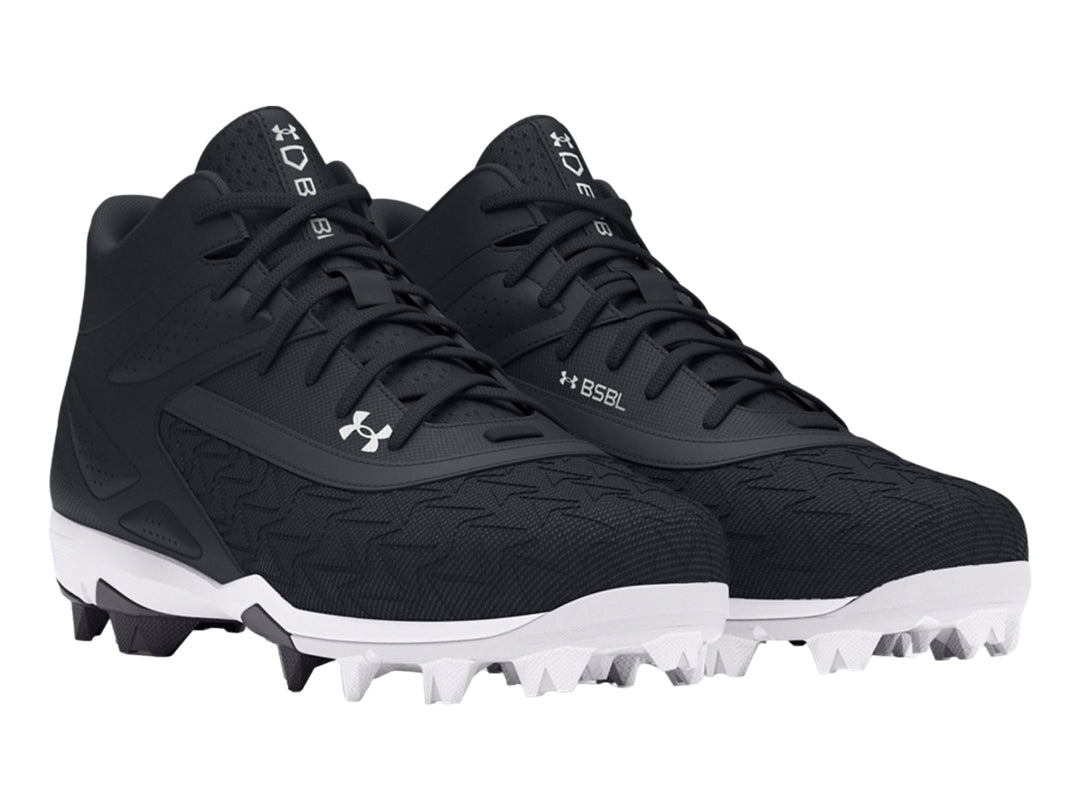 Zapato deportivo Under Armour Leadoff Mid 3.0 en color negro con suela blanca y tacos.