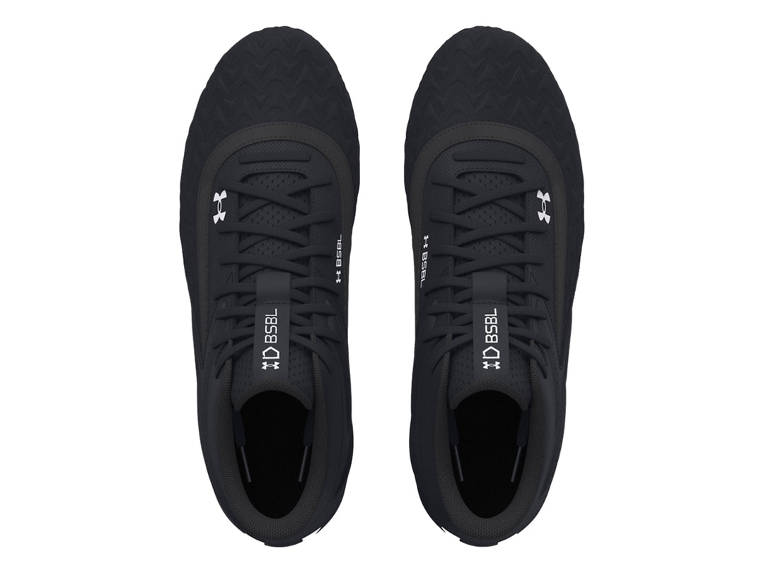 Zapato deportivo Under Armour Leadoff Mid RM JR 3.0 color negro con suela blanca.