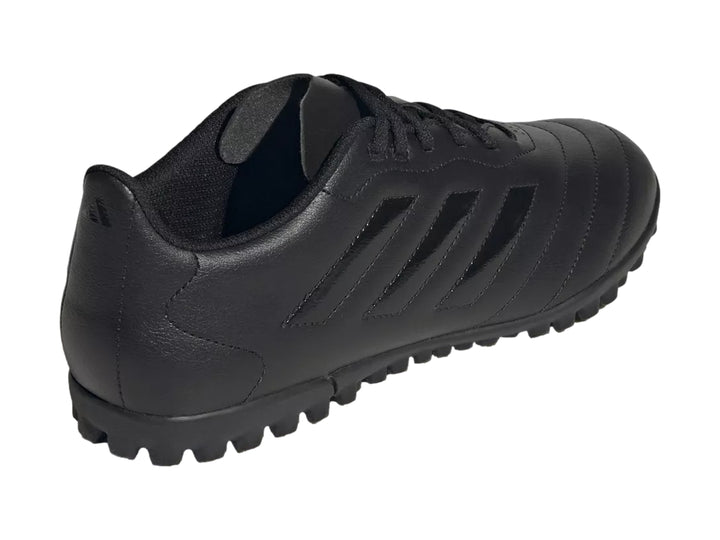 Zapato de fútbol Adidas Goletto VIII TF color negro con suela para césped sintético.