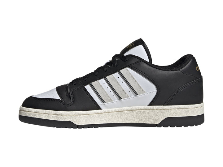 Tenis Adidas Break Start en colores negro y blanco con las tres franjas laterales características.