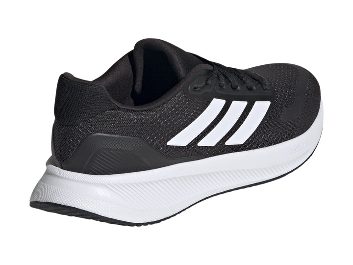 Tenis Adidas Runfalcon 5 en color negro con franjas blancas y suela blanca.