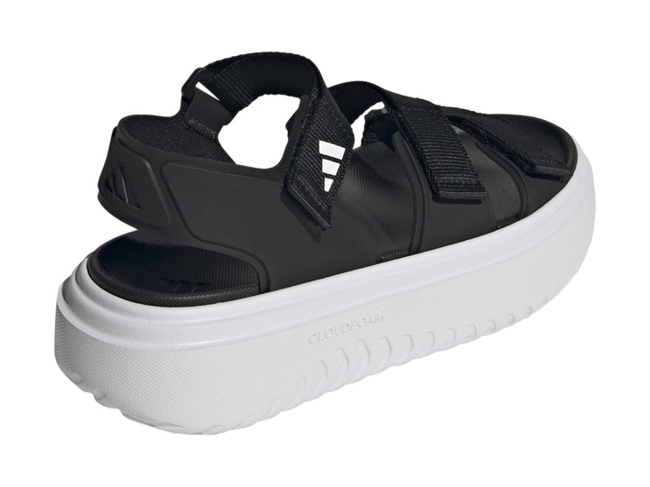 Sandalias Adidas Slyn negras con suela de plataforma blanca y correas ajustables.