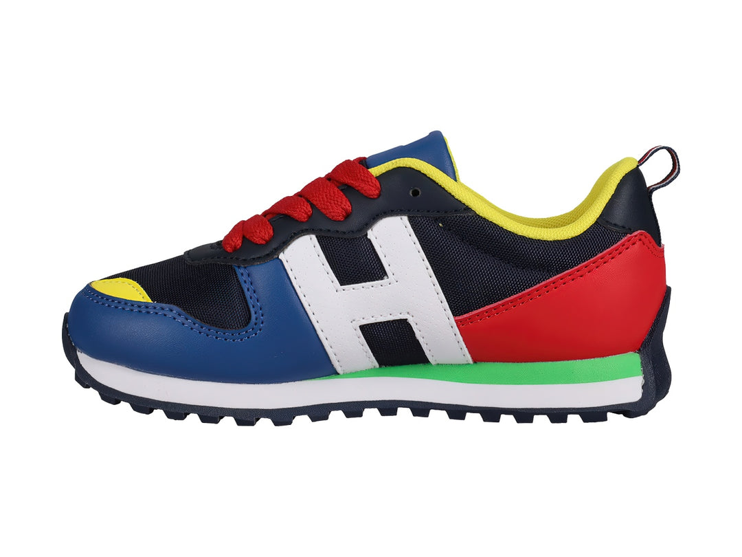 Tenis Tommy Hilfiger modelo Jogger en colores azul, rojo, blanco y amarillo para niño.