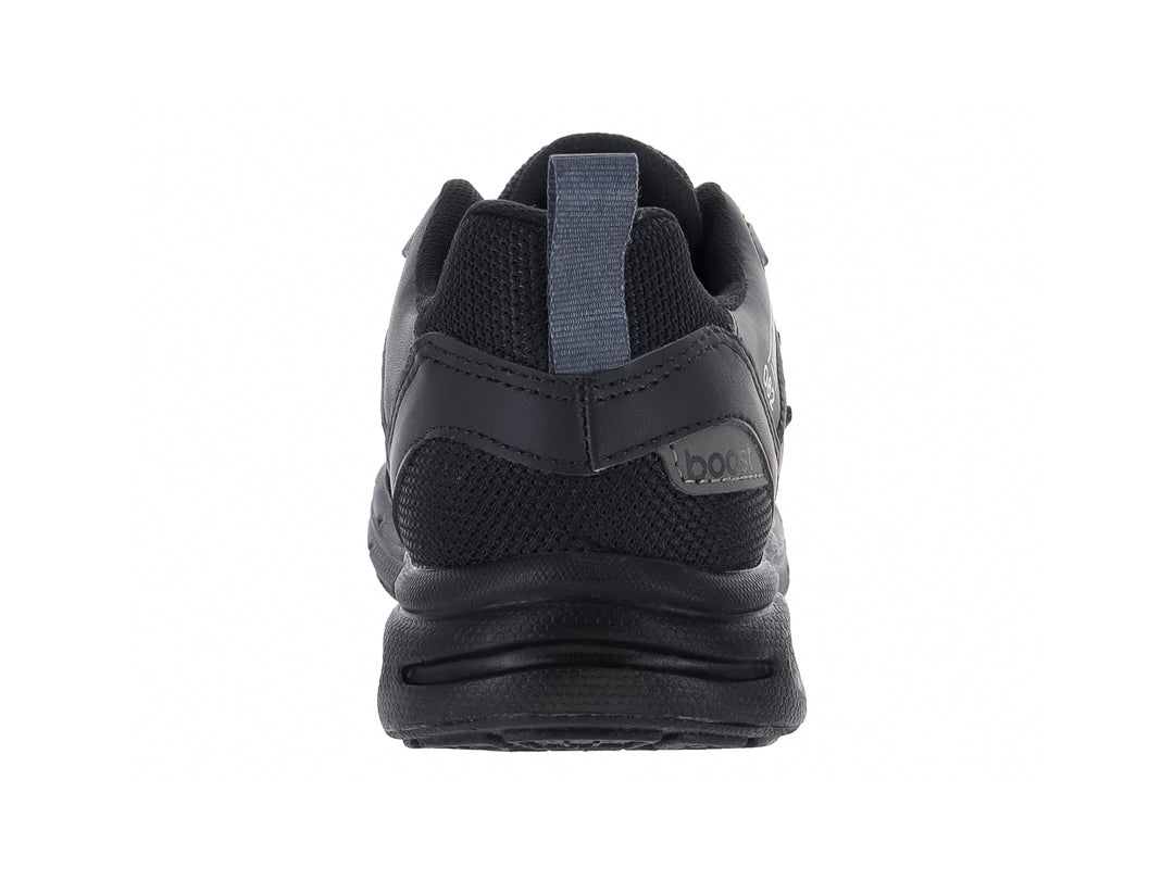Tenis deportivos infantiles color negro con detalles en gris y suela amortiguada.