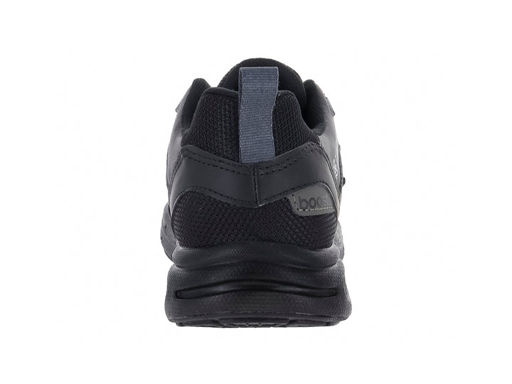 Tenis deportivos infantiles color negro con detalles en gris y suela amortiguada.