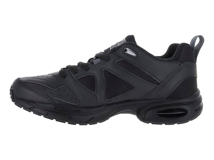 Tenis deportivos infantiles color negro con detalles en gris y suela amortiguada.