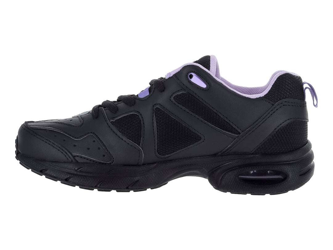 Tenis deportivos color negro con detalles en lila y blanco, vista lateral.