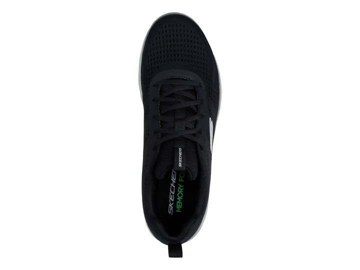 Tenis deportivos Skechers color negro con suela blanca y logotipo lateral en blanco.