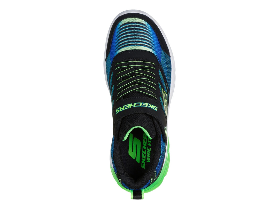 Tenis deportivos Skechers para niño en colores azul, negro y lima con suela blanca y verde.