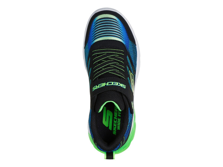Tenis deportivos Skechers para niño en colores azul, negro y lima con suela blanca y verde.
