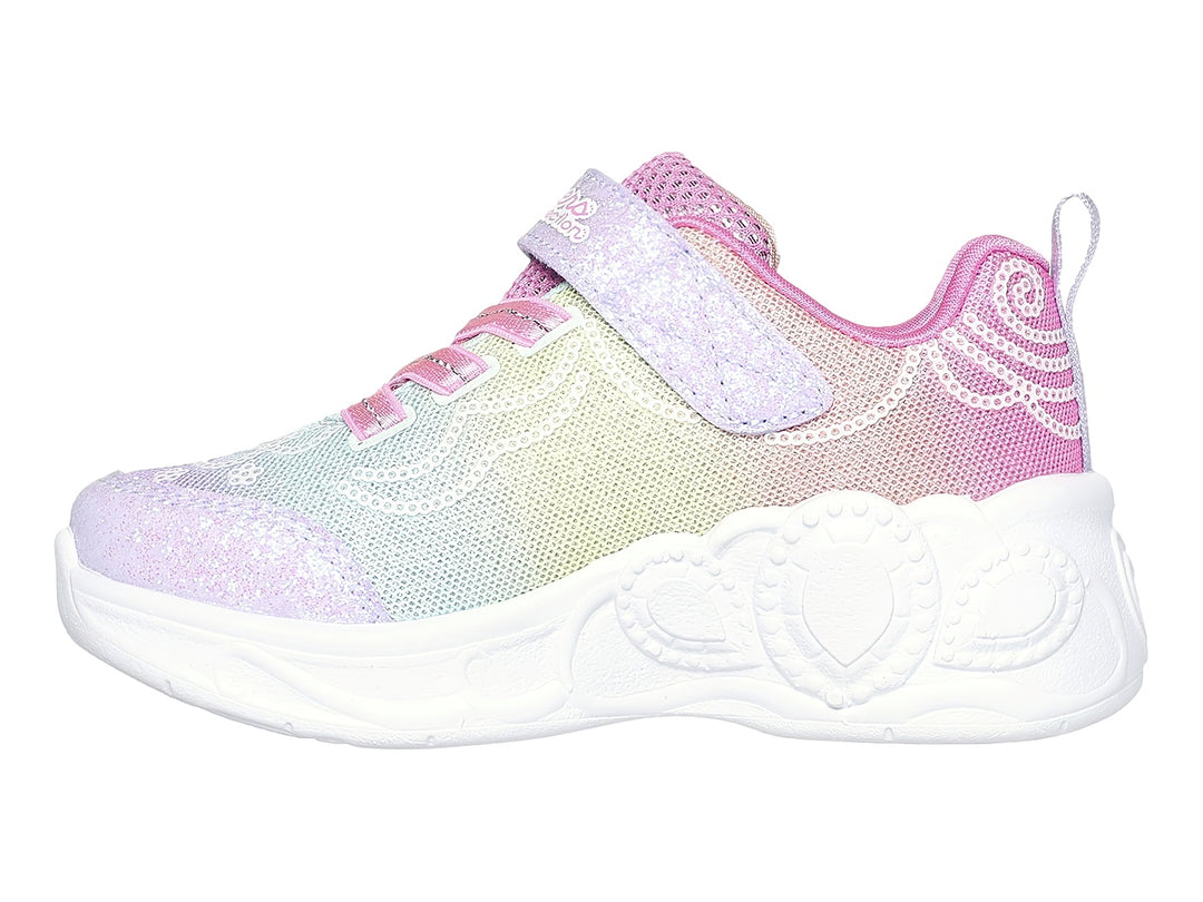 Tenis Skechers para niña en colores multicolor con detalles brillantes y suela blanca decorada.