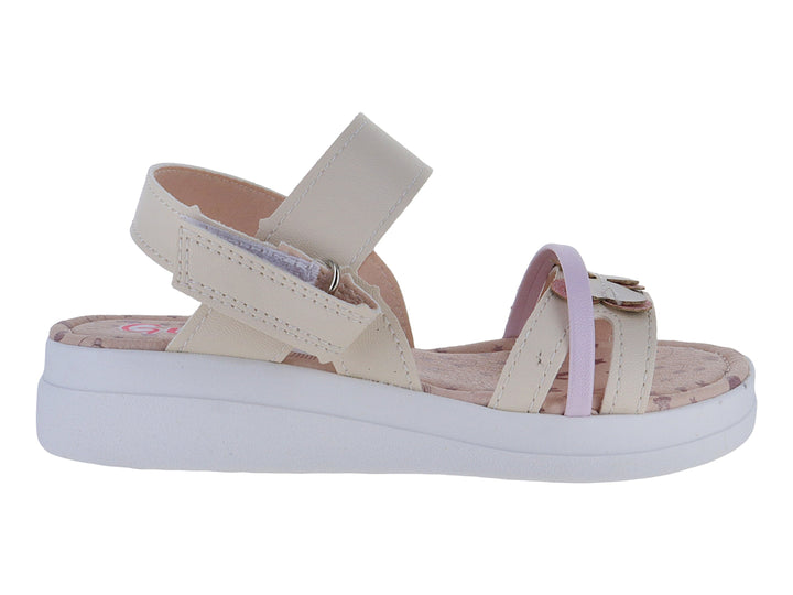 Sandalia para niña color beige con suela blanca de plataforma y correas ajustables.