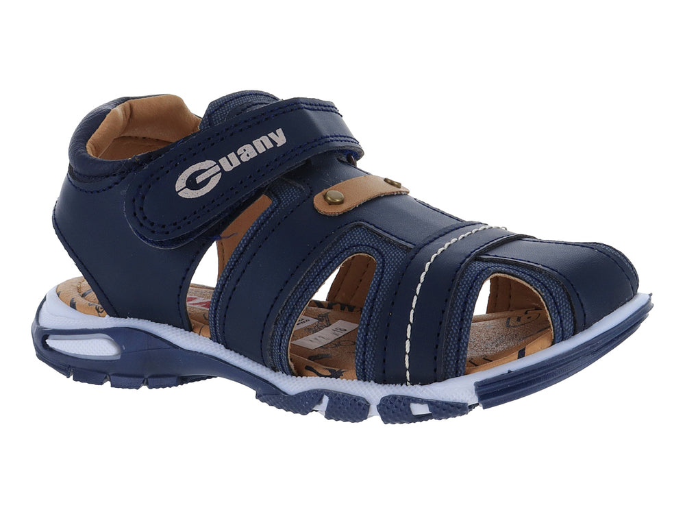 Sandalia Guany para niño en color azul marino con suela blanca y cierre de velcro.