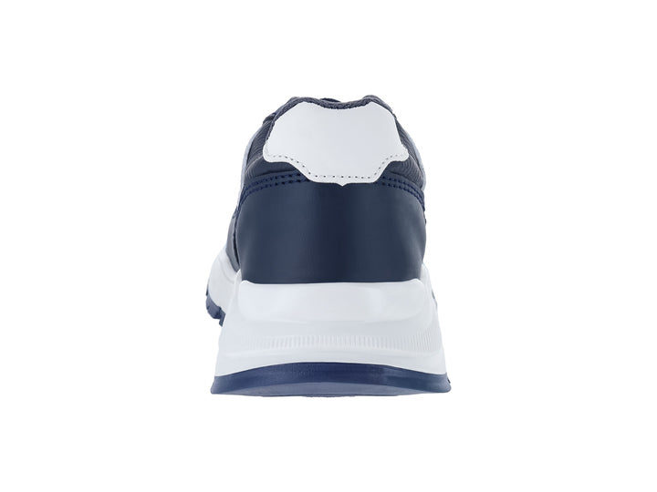 Zapato casual para niño marca Guany en color azul marino con suela blanca y detalles en gris.