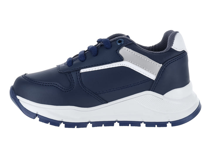 Zapato casual para niño marca Guany en color azul marino con suela blanca y detalles en gris.