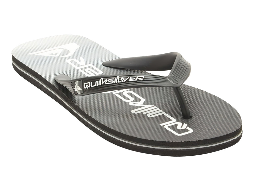 Sandalias Quiksilver color negro con detalles en blanco y correa superior negra.
