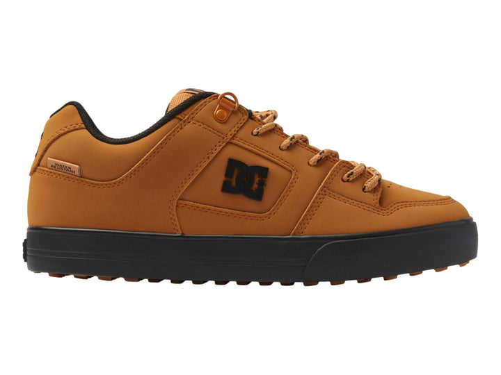 Tenis DC Shoes color trigo con suela negra y cordones a juego, vista lateral.