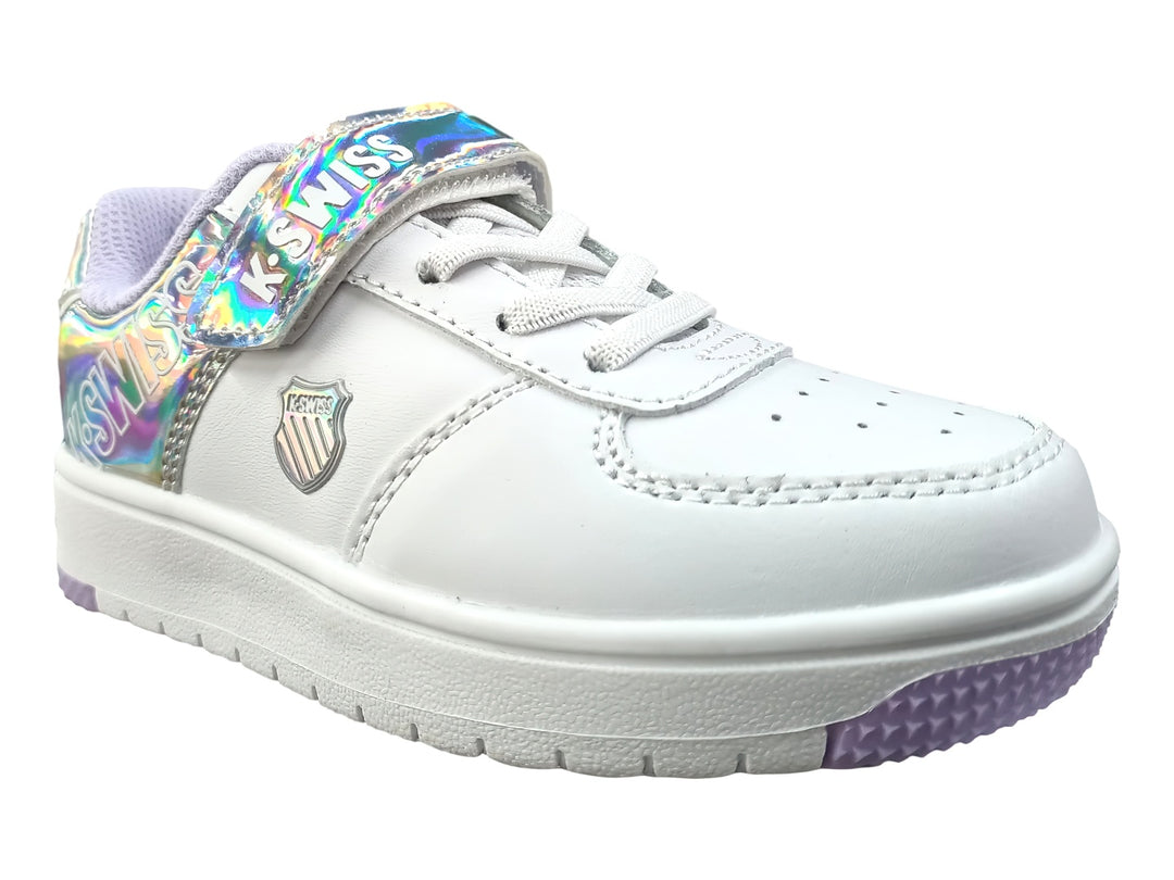 Tenis blancos K-Swiss con detalles iridiscentes y cierre de velcro para niña.