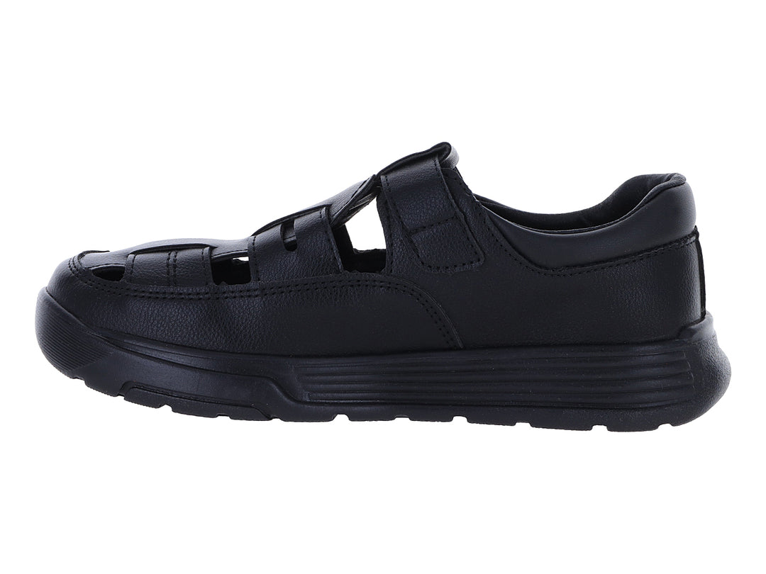 Zapato sandalia color negro con suela gruesa y aberturas laterales.