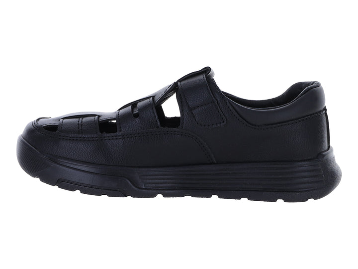 Zapato sandalia color negro con suela gruesa y aberturas laterales.