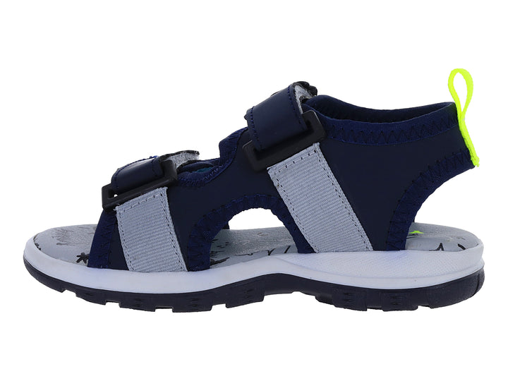 Sandalia infantil color azul marino con lunares blancos y tirador amarillo neón.