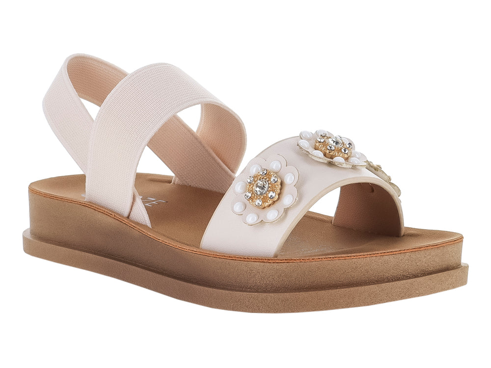 Sandalia de plataforma beige con tiras cruzadas y detalle floral con perlas en la parte superior.