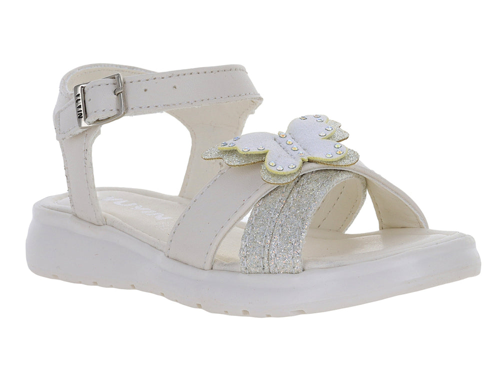 Sandalia blanca para niña con detalle de mariposa brillante y correa ajustable en el tobillo.