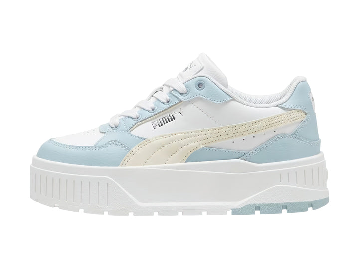 Tenis PUMA blancos y azul claro con suela de plataforma gruesa y cordones blancos.