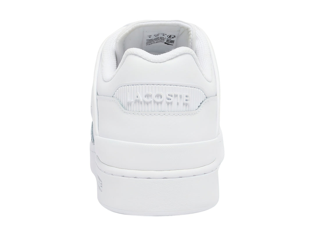 Tenis blancos de cuero Lacoste con logotipo de cocodrilo verde en el lateral.