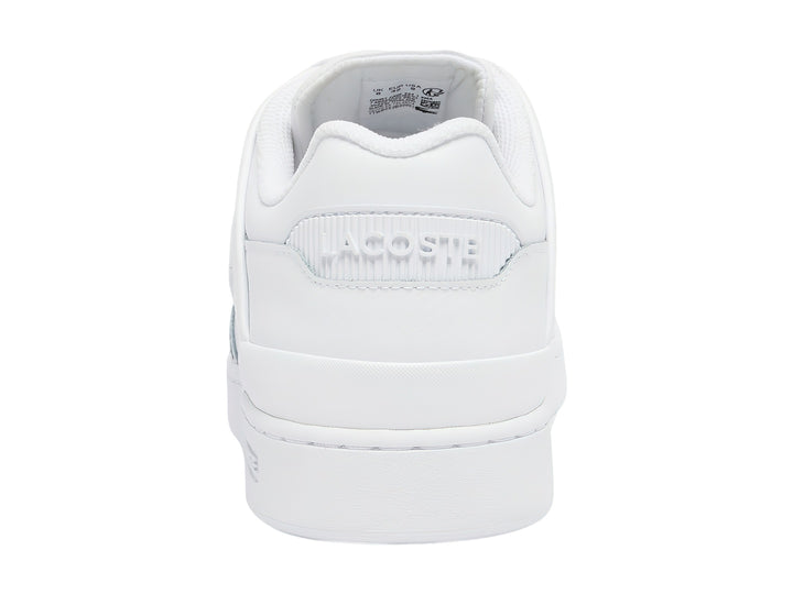 Tenis blancos de cuero Lacoste con logotipo de cocodrilo verde en el lateral.