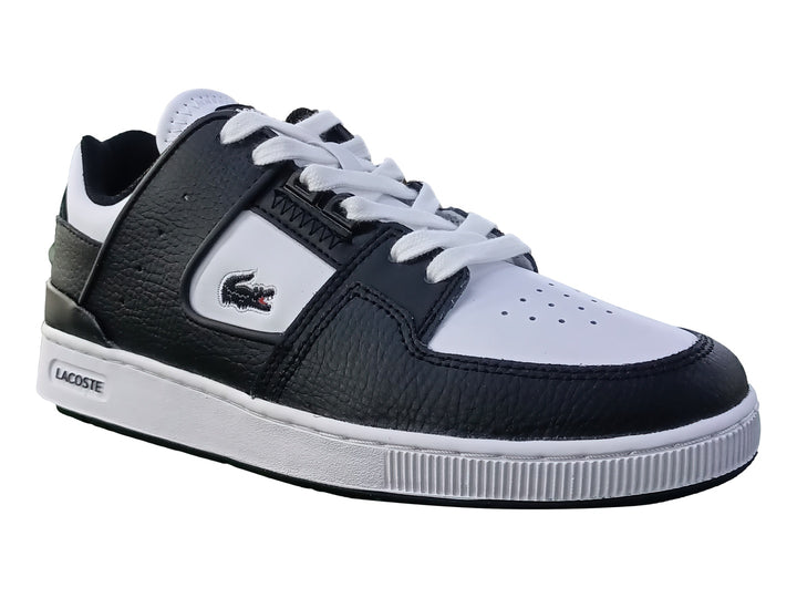 Tenis Lacoste Court Cage color negro y blanco con suela blanca y logo lateral.