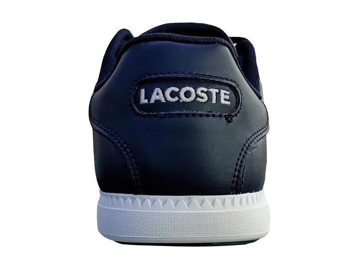 Tenis Lacoste Graduate en color azul marino con suela blanca y franja decorativa roja y blanca lateral.