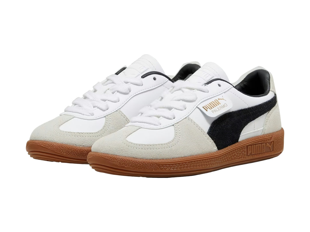 Tenis PUMA Palermo LTH JR en color blanco con detalles en negro y gris, y suela de goma color café.