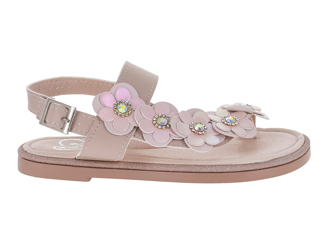 Sandalia color rosa pálido para niña con adornos de flores y pedrería en la parte superior.