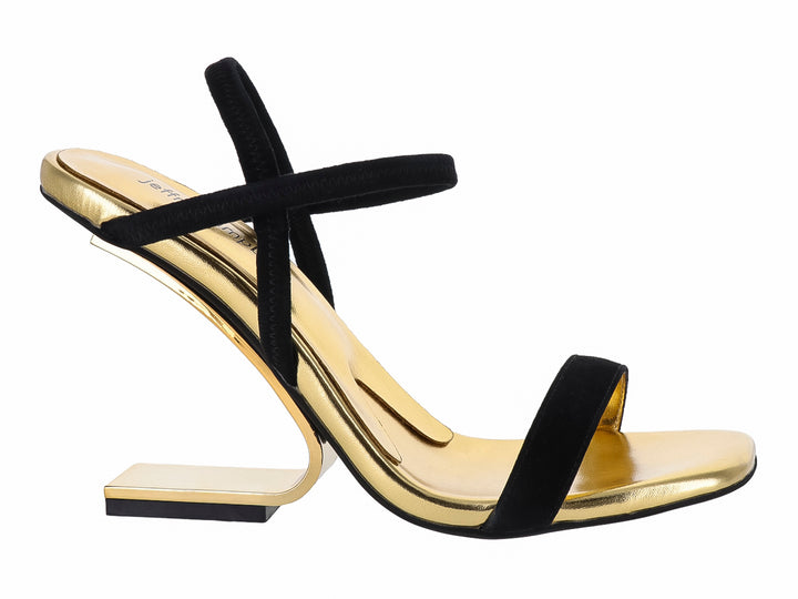 Sandalia Jeffrey Campbell negra con suela y tacón geométrico en color dorado brillante.