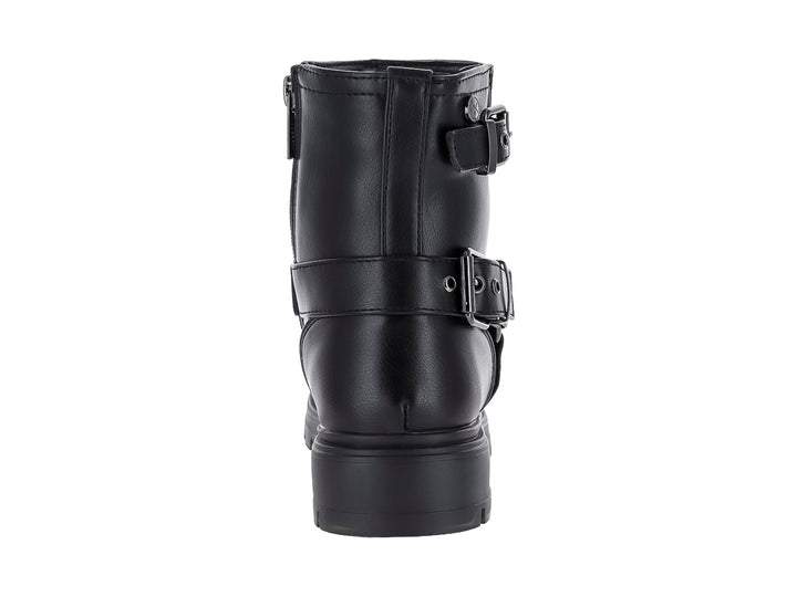 Bota negra de caña corta con hebillas decorativas y suela track gruesa.