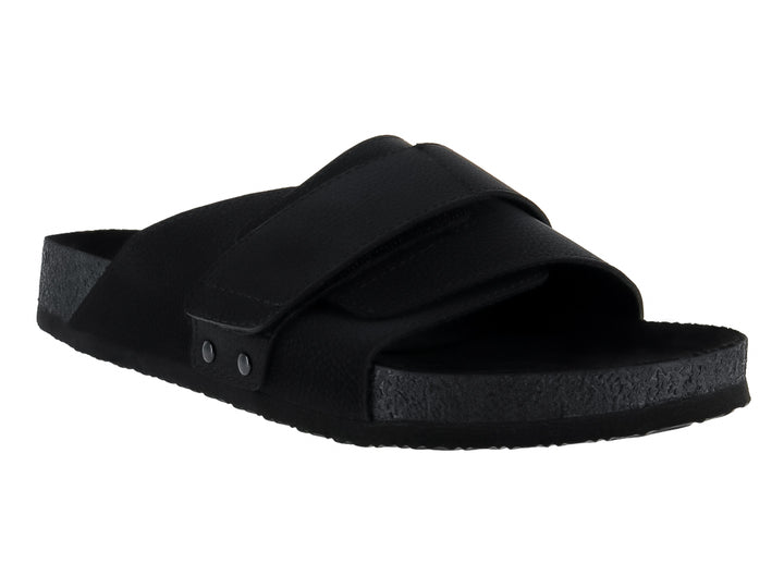 Sandalia deslizable color negro con correa ancha y botones decorativos.