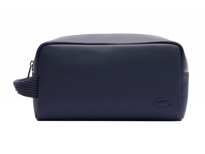 Estuche organizador Lacoste color navy con asa lateral y cierre superior.