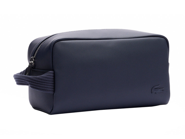 Estuche organizador Lacoste color navy con asa lateral y cierre superior.