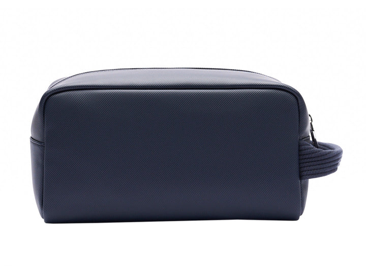 Estuche organizador Lacoste color navy con asa lateral y cierre superior.