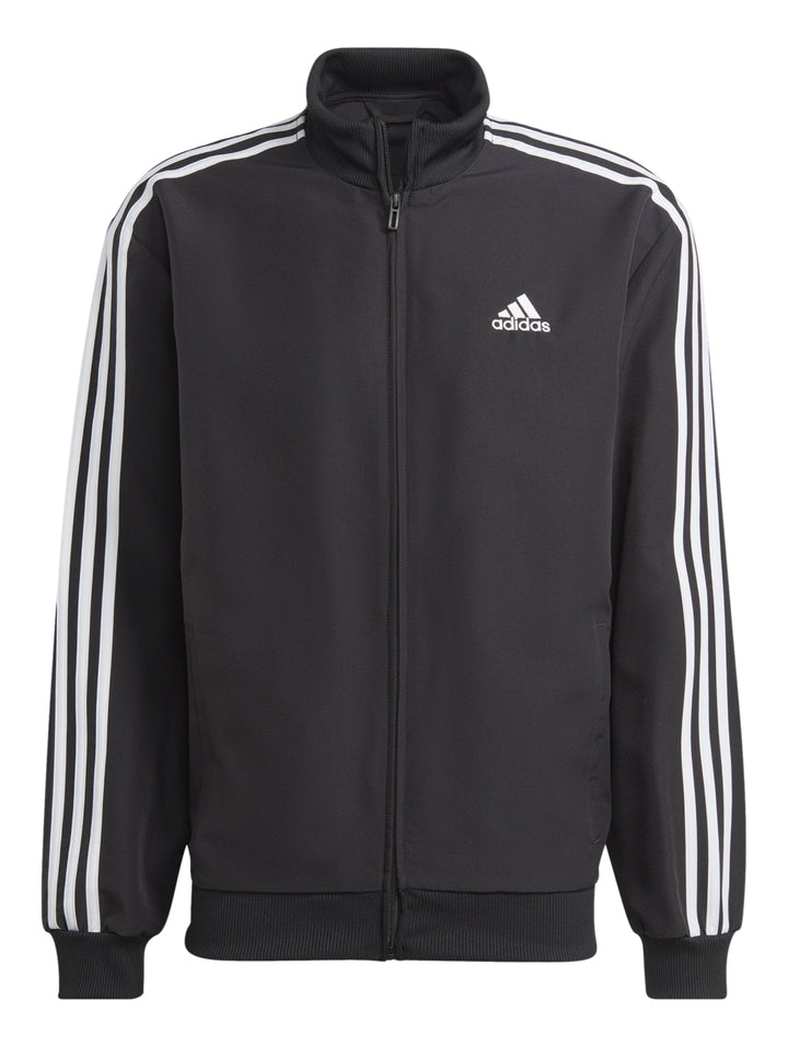 Conjunto deportivo Adidas negro con tres franjas blancas laterales compuesto por chaqueta y pantalón.