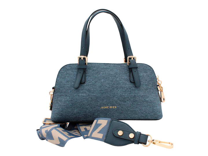 Bolso de mano azul mezclilla con asas, correa larga y detalles metálicos dorados.