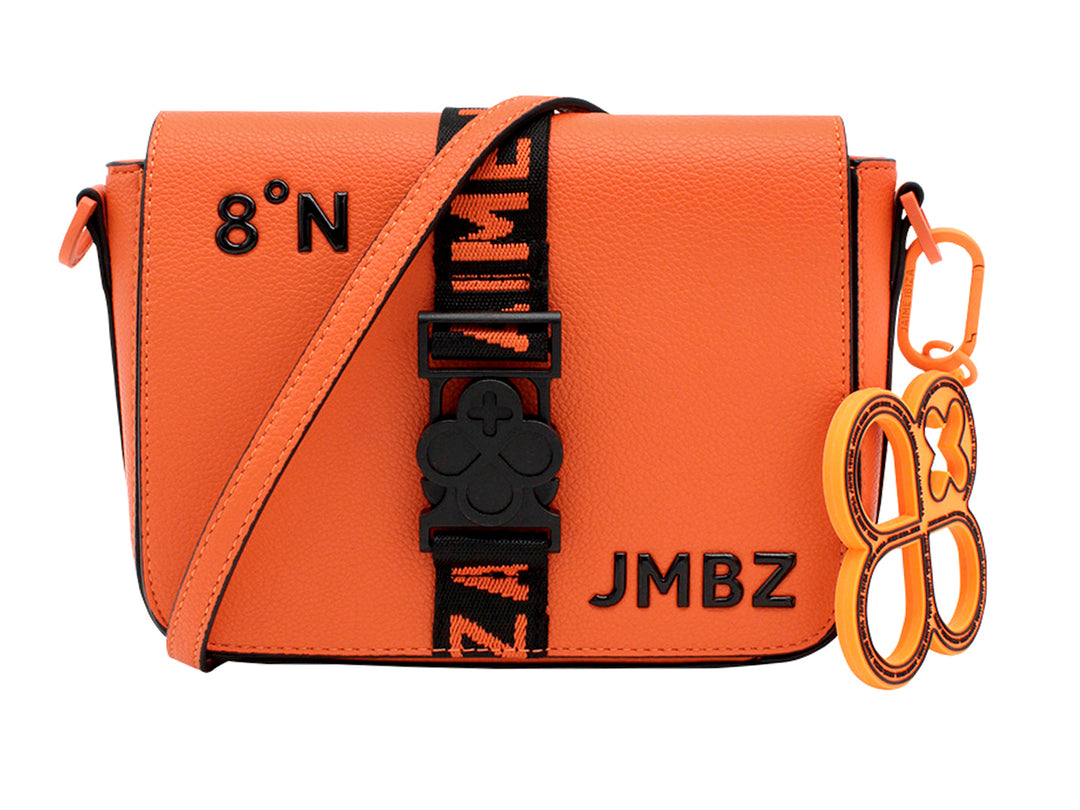 Bolso de hombro Jaime Ibiza color naranja con correa negra y accesorio colgante decorativo.