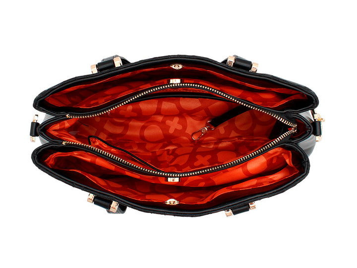 Bolso de hombro negro Jaime Ibiza con textura acolchada en relieve y detalles metálicos dorados.
