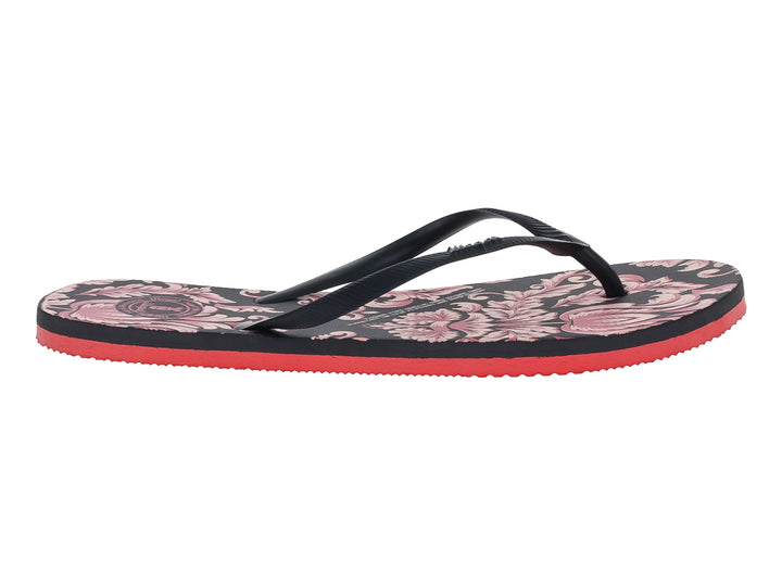 Sandalias negras con estampado floral rosa y suela roja de la marca Illegal.