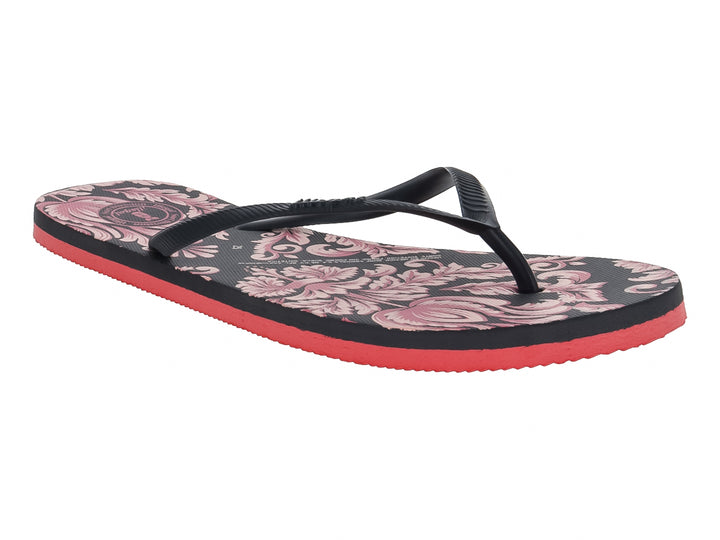 Sandalias negras con estampado floral rosa y suela roja de la marca Illegal.