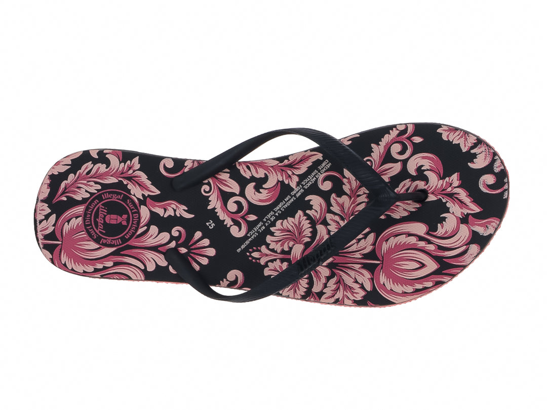 Sandalias negras con estampado floral rosa y suela roja de la marca Illegal.