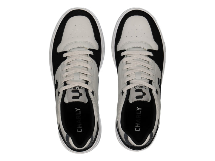 Tenis deportivos Charly en colores gris, negro y blanco con suela blanca y base café.