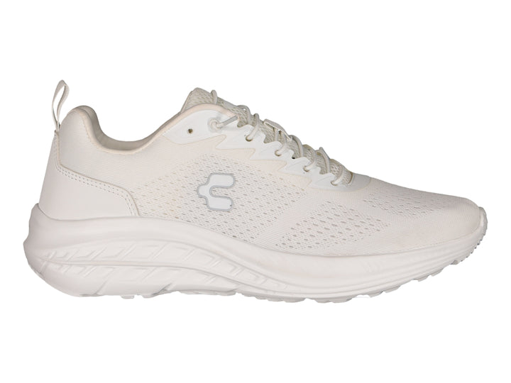 Tenis deportivos Charly color blanco con malla transpirable y suela blanca.
