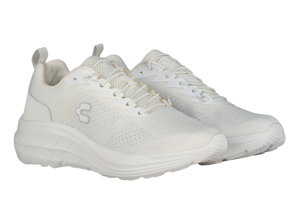 Tenis deportivos Charly color blanco con malla transpirable y suela blanca.